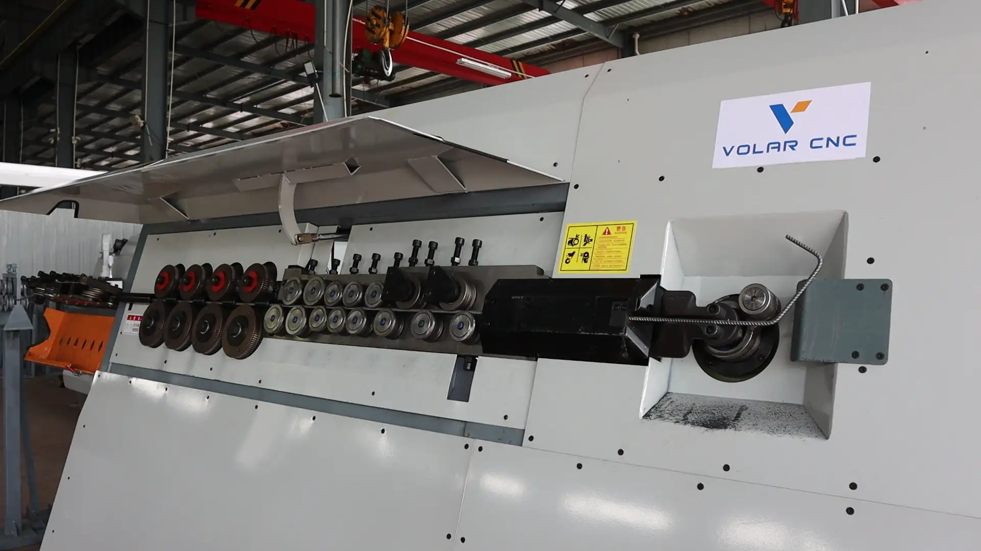 Detail of the high-hardness alloy straightening rollers on automatic rebar processing machine.