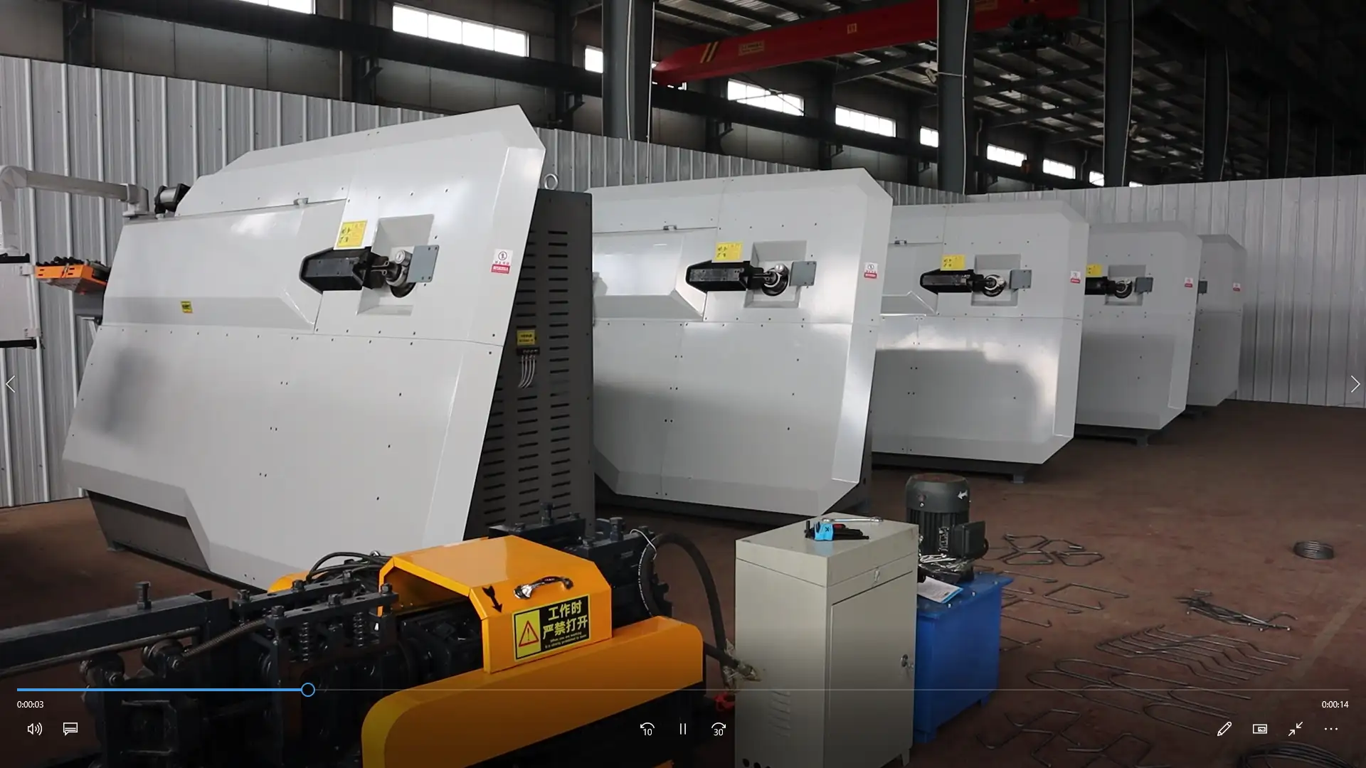 Multiple Volar VLGW6-12 intelligent stirrup bending machines lined up in the workshop, awaiting final packing and shipment to global customers.