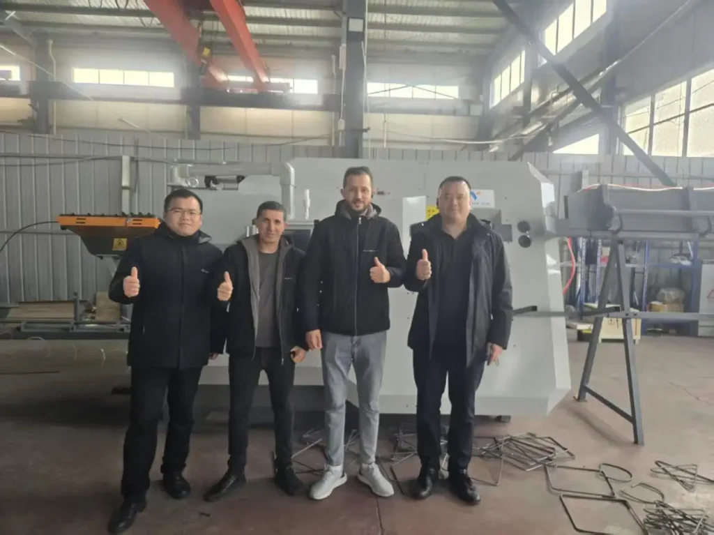Solving Precision & Capacity Issues: 12mm Intelligent Rebar Stirrup Bending Machine for Precast Factory Precast-concrete-factory-partners-inspecting-the-VLGW12-Pro-Max-intelligent-rebar-bending-production-line