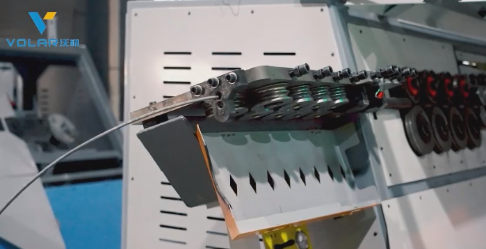 Overcoming Slippage and Inertia: How the VLGW12B CNC Rebar Bender Revolutionizes Stirrup Production Close-up of the industry-exclusive 8-wheel traction and pre-straightening mechanism on the VLGW12B CNC rebar bending machine, processing coiled steel wire without slippage